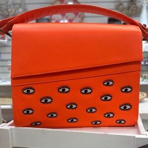 Min & Mon Anastasio Mini Orange Crossbody Bag with Eye Design